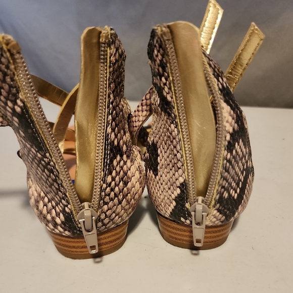 Black and Gold Gladiator Sandals with Metallic Buckles - Picture 3 of 6